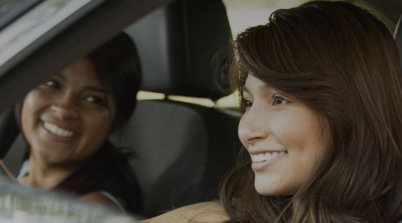 Two women driving